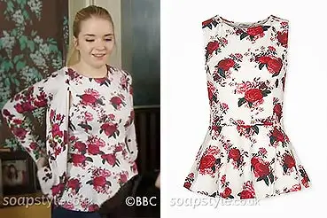 Abi Branning wearing a rose floral top on EastEnders