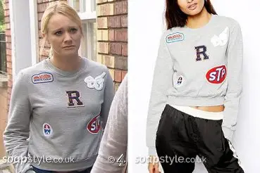Leela Lomax grey badge sweater worn on Hollyoaks