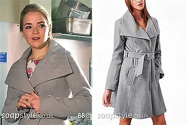 Abi Branning wearing a grey wrap coat on EastEnders