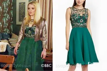 Abi wearing a green embellished dress on EastEnders