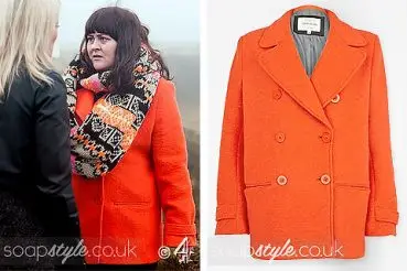 Tegan Lomax Hollyoaks wearing an orange coat
